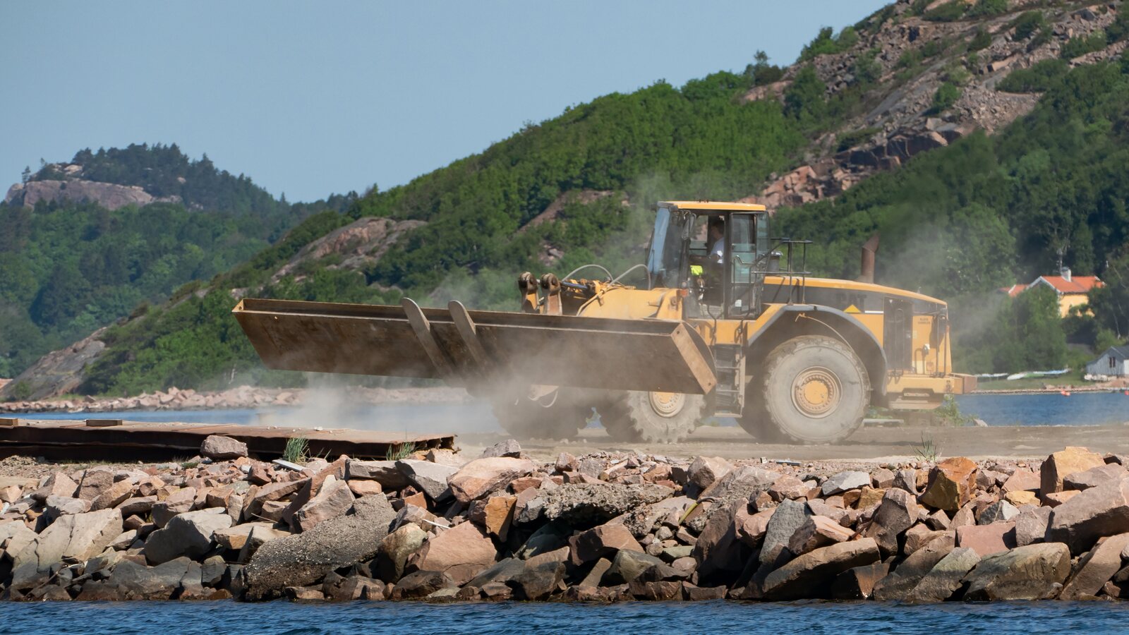 Caterpillar wheel loader moving material on a civil site