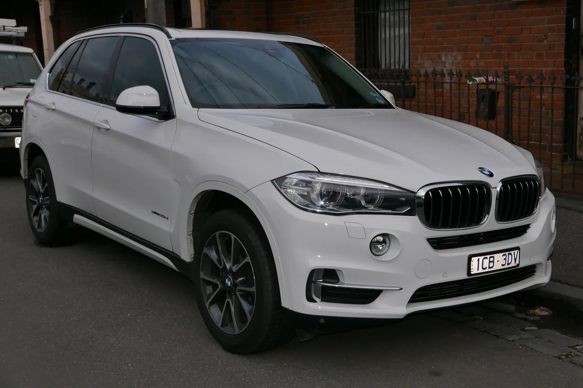 White BMW X5 SUV photographed in Australia as a representative touring application
